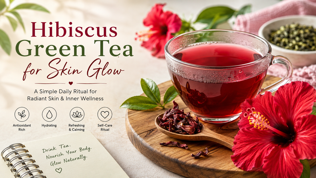 Cup of hibiscus green tea with hibiscus flowers and green tea leaves, representing a calming wellness ritual for skin glow and self-care